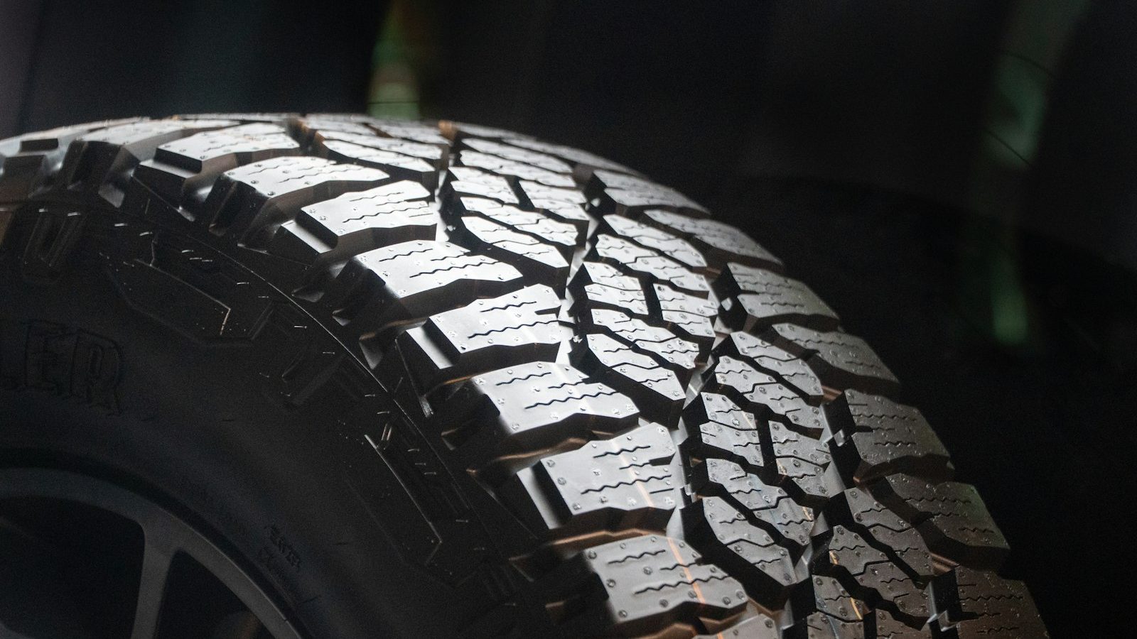 Close-up of an all-terrain tire tread pattern