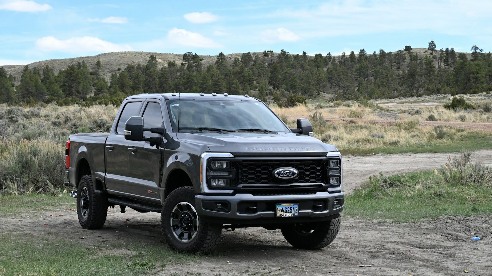 Ford Super Duty pickup on a gravel road in sagebrush country